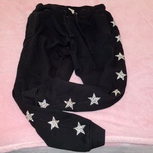 Size M Carmar black joggers with rhinestone stars